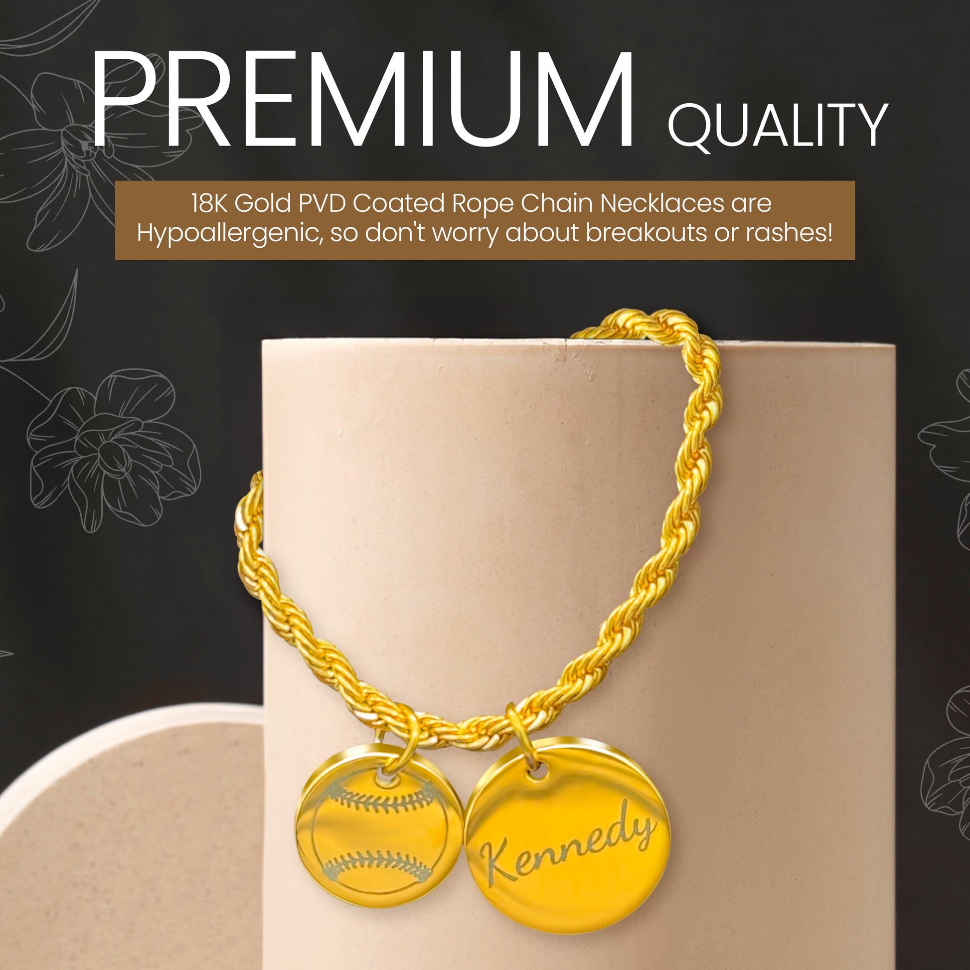 Gold two rope necklace with two charms, one with image of a softball, the other with the name "Kennedy" with letting calling out Premium Quality and Hypoallergenic properties of the necklace. 